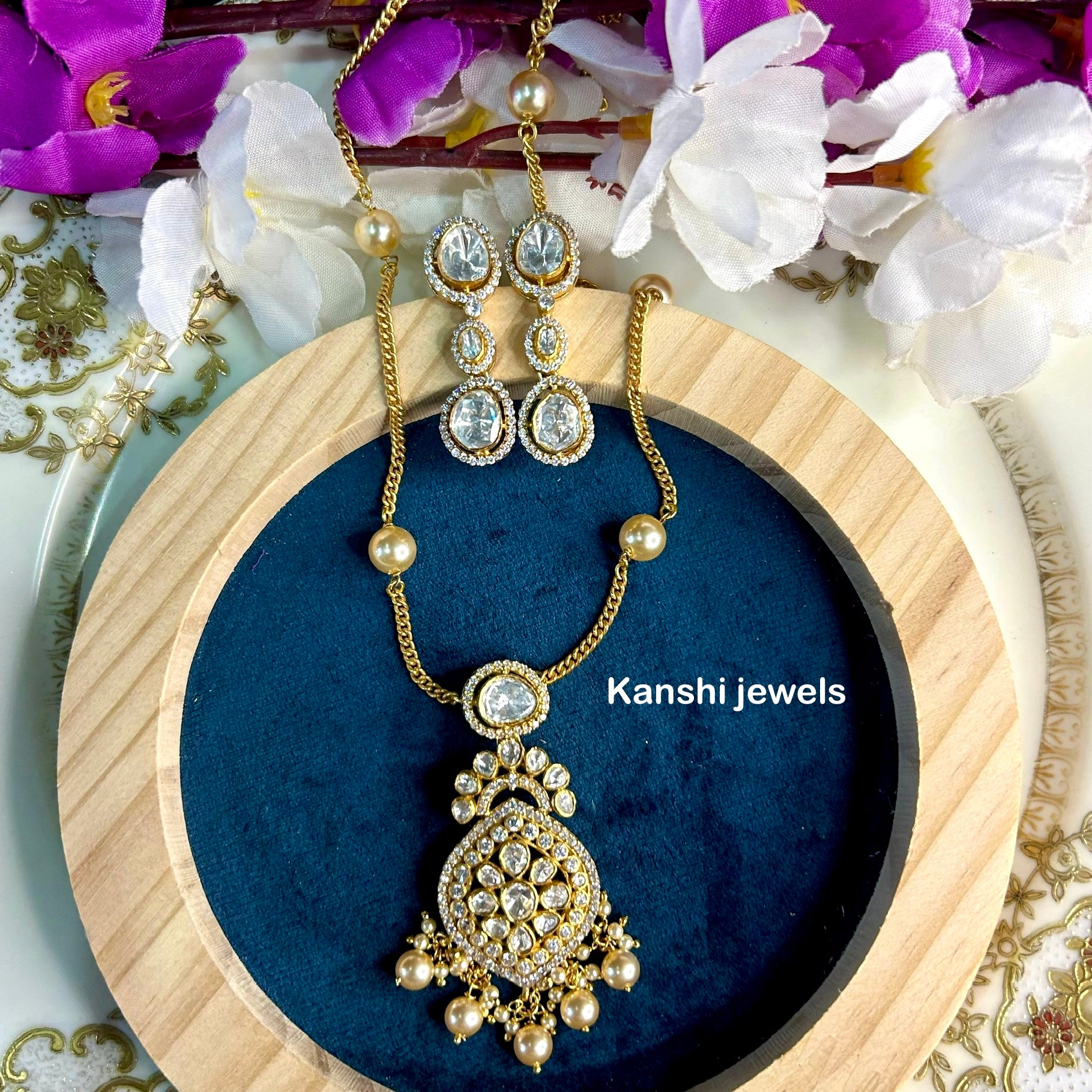 Silver moissanite pendant and earrings