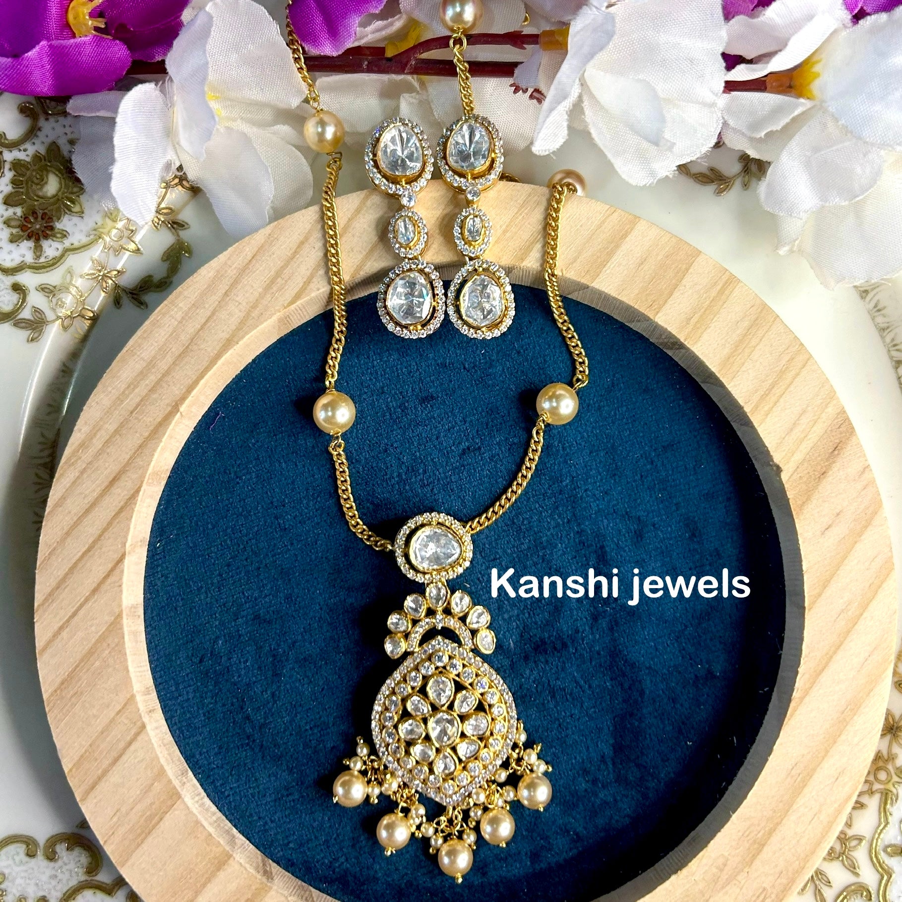 Silver moissanite pendant and earrings